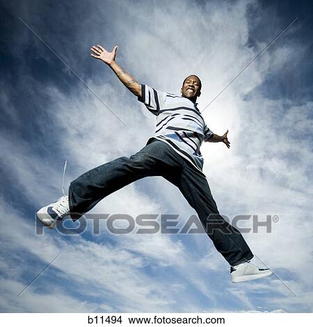African American man jumping View Large Photo Image Picture - African American man jumping. Fotosearch