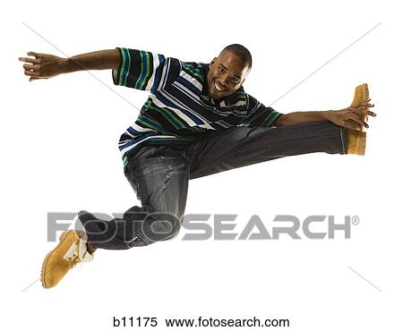 Stock Photography - African American man jumping. Fotosearch