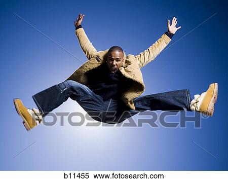 African American man jumping View Large Photo Image Stock Photography - African American man jumping. Fotosearch