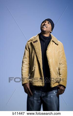 African American man looking up and thinking View Large Photo Image Stock Photo - African American man looking up and thinking. Fotosearch