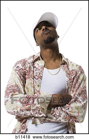 Stock Photo - African American thinking with arms folded. Fotosearch