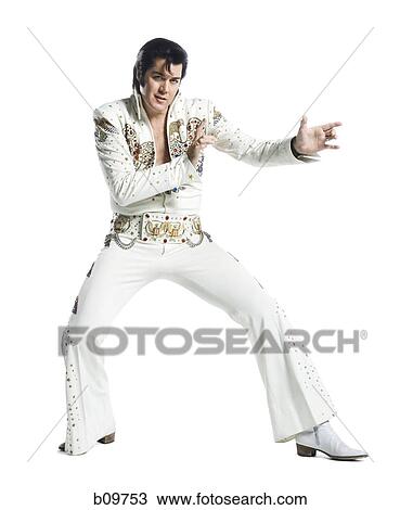 Stock Image - An Elvis impersonator dancing. Fotosearch