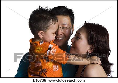 Asian parents with young boy View Large Photo Image Stock Photo - Asian parents with young boy. Fotosearch