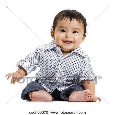 Stock Image - Baby Boy sitting and smiling. Fotosearch