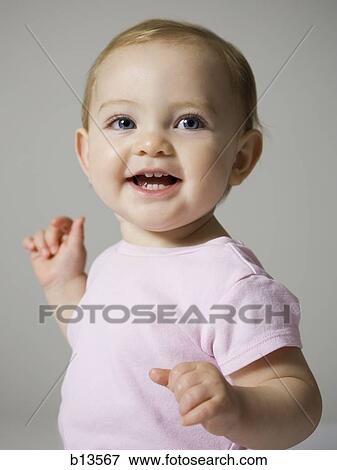 Baby Girl smiling View Large Photo Image Stock Photo - Baby Girl smiling. Fotosearch