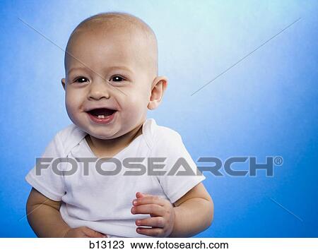 Baby smiling with copy space View Large Photo Image Stock Image - Baby smiling with copy space. Fotosearch