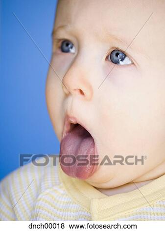 Stock Photo - Baby Sticking Tongue Out. Fotosearch