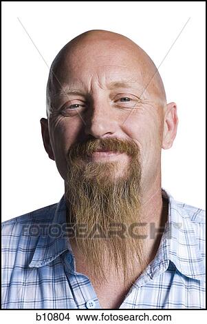 Bald middle aged man with a long goatee View Large Photo Image Picture - Bald middle aged man with a long goatee. Fotosearch