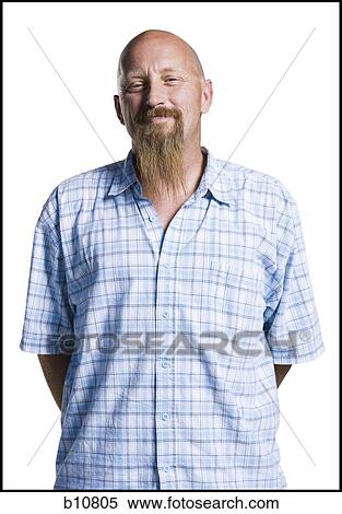 Bald middle aged man with a long goatee View Large Photo Image Stock Photography - Bald middle aged man with a long goatee. Fotosearch