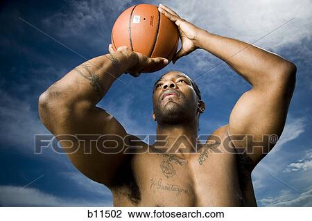 Basketball player shooting ball View Large Photo Image Stock Image - Basketball player shooting ball. Fotosearch