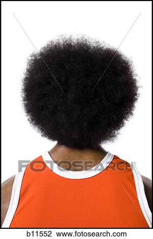 Basketball player with an afro in orange uniform View Large Photo Image Stock Image - Basketball player with an afro in orange uniform. Fotosearch