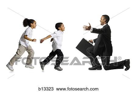 Boy and girl running toward kneeling businessman View Large Photo Image Stock Image - Boy and girl running toward kneeling businessman. Fotosearch