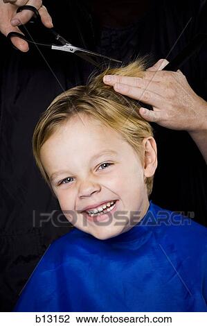 Boy having his hair cut smiling View Large Photo Image Stock Image - Boy having his hair cut smiling. Fotosearch