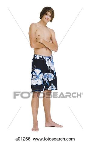 Stock Photograph - Boy in swim trunks. Fotosearch
