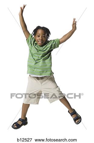 Boy jumping View Large Photo Image Stock Photo - Boy jumping. Fotosearch