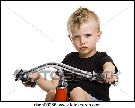 Stock Photograph - Boy on bicycle. Fotosearch