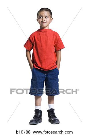 Boy standing with hands in pockets View Large Photo Image Stock Photo - Boy standing with hands in pockets. Fotosearch