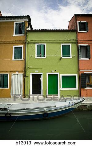 Stock Image - Buildings on Burano Island in Venice Italy. Fotosearch