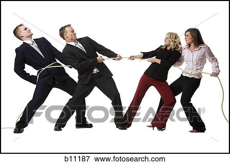 Stock Photo - Business people engaged in a tug of war contest. Fotosearch