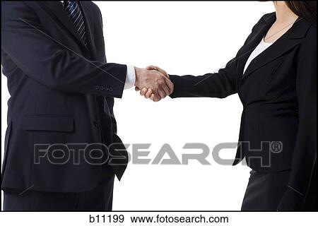 Stock Photo - Businessman and businesswoman shaking hands. Fotosearch