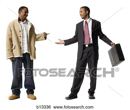 Businessman and casually dressed twins View Large Photo Image Stock Photograph - Businessman and casually dressed twins. Fotosearch