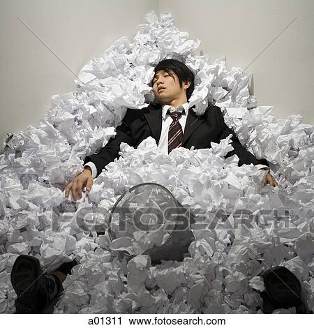 Businessman buried in mountain of crumpled papers View Large Photo Image Stock Image - Businessman buried in mountain of crumpled papers. Fotosearch