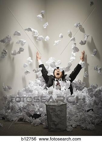 Businessman buried in mountain of crumpled papers View Large Photo Image Stock Photograph - Businessman buried in mountain of crumpled papers. Fotosearch