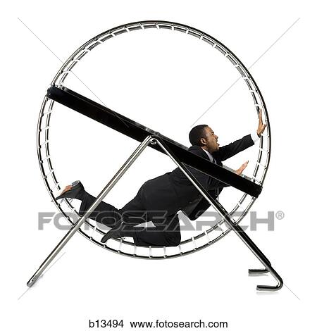 Businessman crawling in rodent wheel View Large Photo Image Picture - Businessman crawling in rodent wheel. Fotosearch