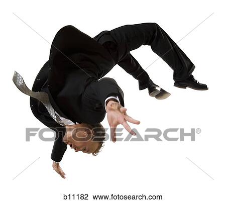Stock Image - Businessman diving. Fotosearch