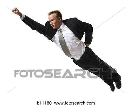 Businessman flying through the air View Large Photo Image Stock Image - Businessman flying through the air. Fotosearch