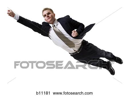 Businessman flying through the air View Large Photo Image Stock Image - Businessman flying through the air. Fotosearch