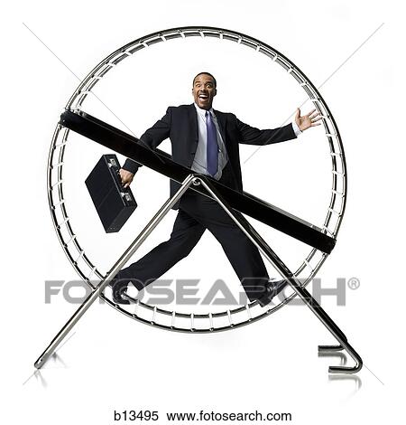 Businessman in rodent wheel smiling View Large Photo Image Stock Photography - Businessman in rodent wheel smiling. Fotosearch