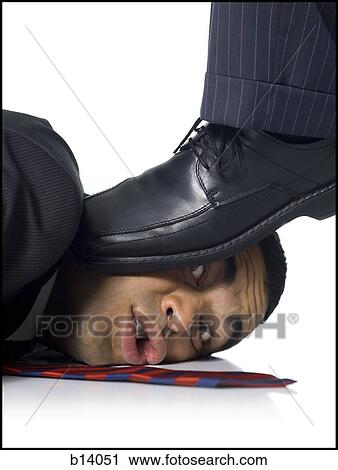 Businessman lying down being stepped on View Large Photo Image Stock Image - Businessman lying down being stepped on. Fotosearch