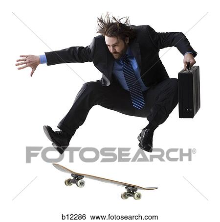 Stock Photograph - Businessman on skateboard jumping. Fotosearch