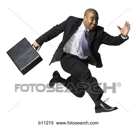 Businessman running View Large Photo Image Stock Photography - Businessman running. Fotosearch