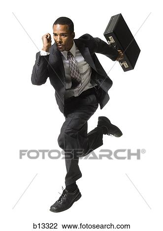 Businessman running with briefcase View Large Photo Image Stock Image - Businessman running with briefcase. Fotosearch