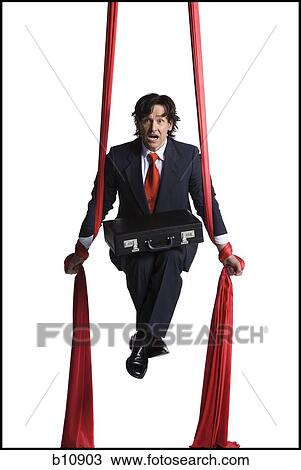 Businessman tangled in red drapes View Large Photo Image Stock Image - Businessman tangled in red drapes. Fotosearch