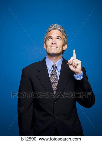 Stock Image - Businessman with an idea. Fotosearch