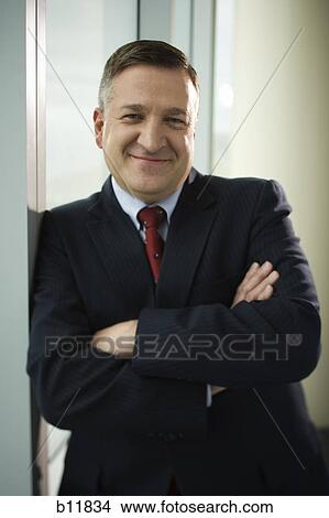 Picture - Businessman with crossed arms. Fotosearch