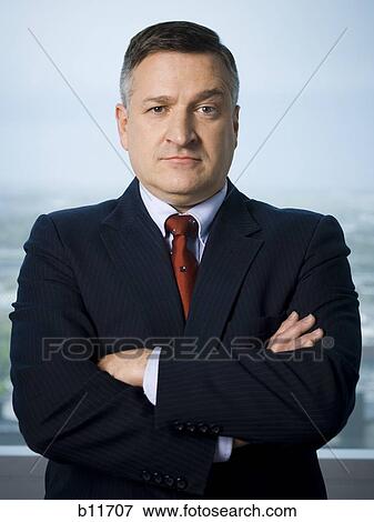 Businessman with crossed arms View Large Photo Image Stock Photo - Businessman with crossed arms. Fotosearch