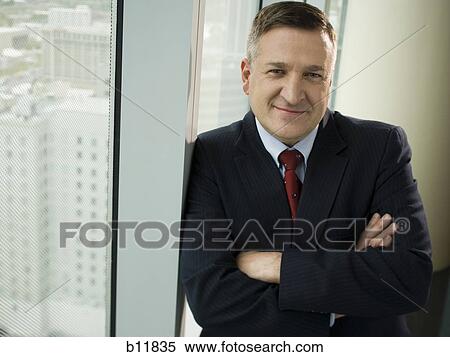 Businessman with crossed arms View Large Photo Image Stock Photography - Businessman with crossed arms. Fotosearch
