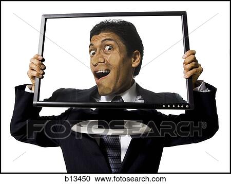 Businessman with funny face on monitor View Large Photo Image Stock Image - Businessman with funny face on monitor. Fotosearch