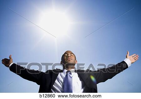 Businessman with outstretched arms View Large Photo Image Stock Image - Businessman with outstretched arms. Fotosearch
