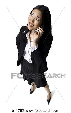 Businesswoman on cell phone View Large Photo Image Stock Image - Businesswoman on cell phone. Fotosearch
