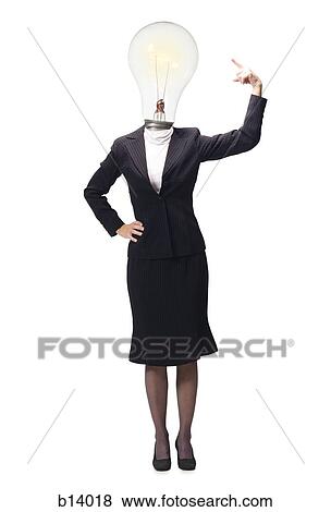 Businesswoman pointing at light bulb on head View Large Photo Image Stock Photo - Businesswoman pointing at light bulb on head. Fotosearch