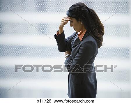 Stock Photograph - Businesswoman thinking. Fotosearch
