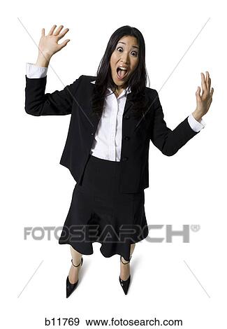 Businesswoman with hands up View Large Photo Image Stock Photo - Businesswoman with hands up. Fotosearch