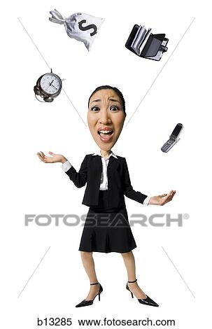 Stock Photography - Caricature of businesswoman juggling. Fotosearch