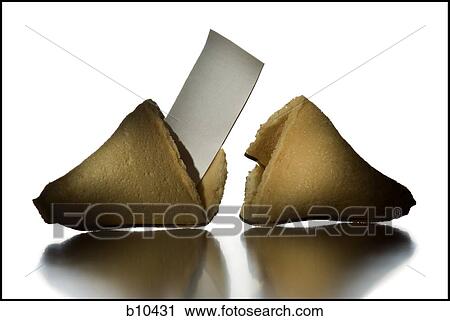 Stock Image - Close-up of a broken fortune cookie with a slip of paper. Fotosearch