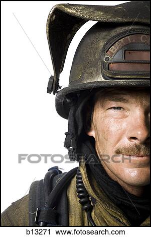 Close-up of a firefighter View Large Photo Image Stock Image - Close-up of a firefighter. Fotosearch